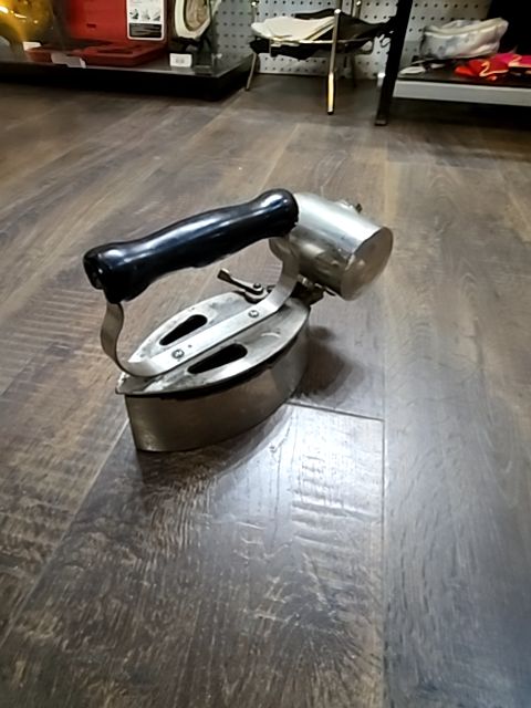 Modern specialities mfg. Modlrn gasoline iron