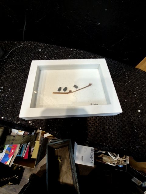 Hand crafted picture of birds on a branch