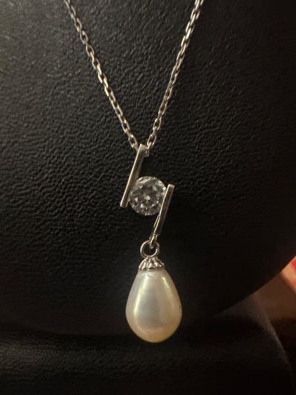 Pearl, CZ, and sterling necklace