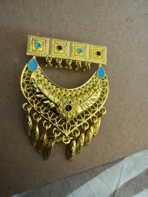 Omani style gold tone brooch