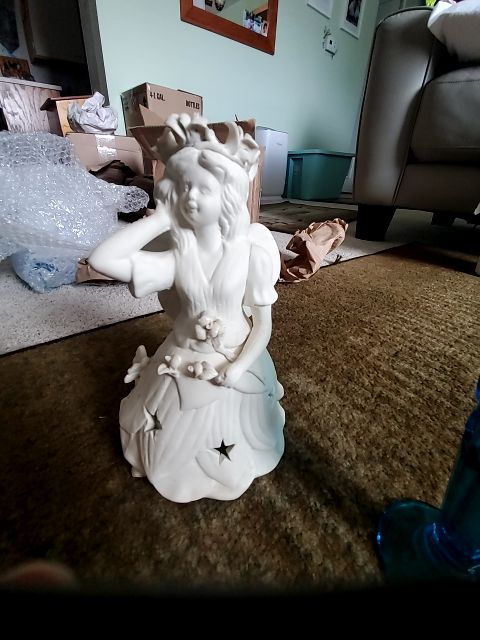 Porcelain fairy tealight holder