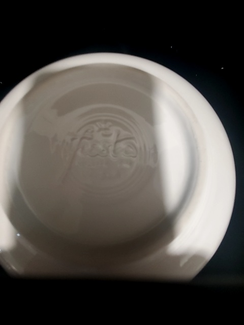 Fiestaware Serving bowl with holly and ribbon