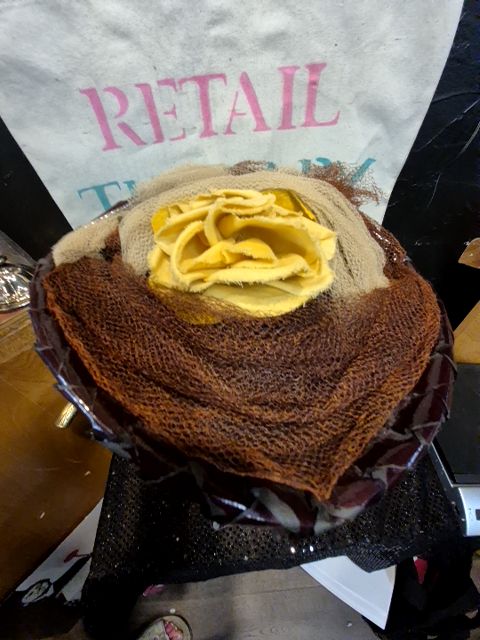 Brown Hat w/yellow flower and brown & tan netting
