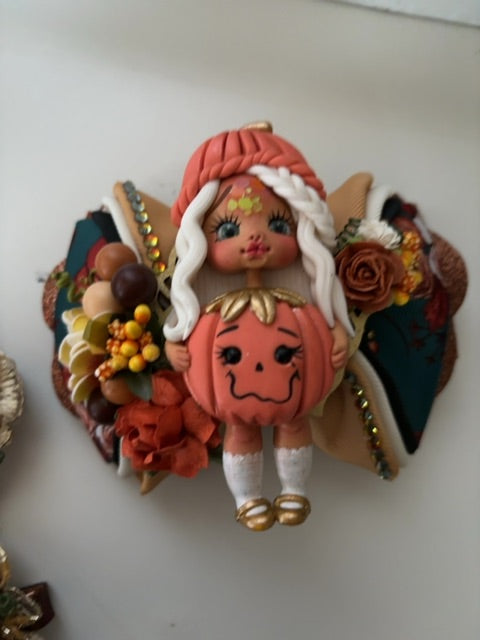 Orange MysticalCreationsByMaira Pumpkin OOAK clay hairbow