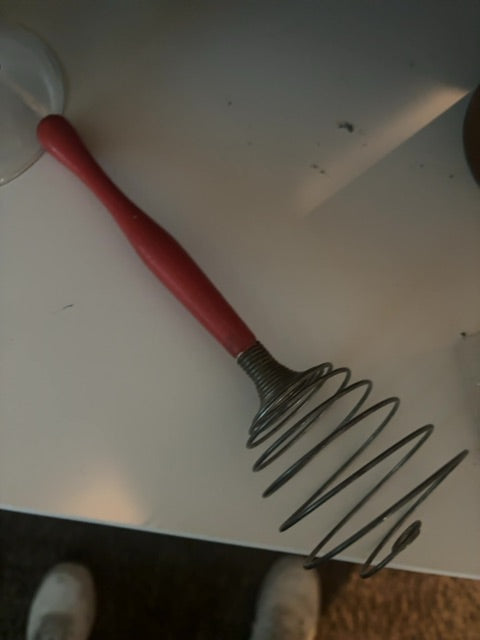 Vintage wire spiral red handle whisk