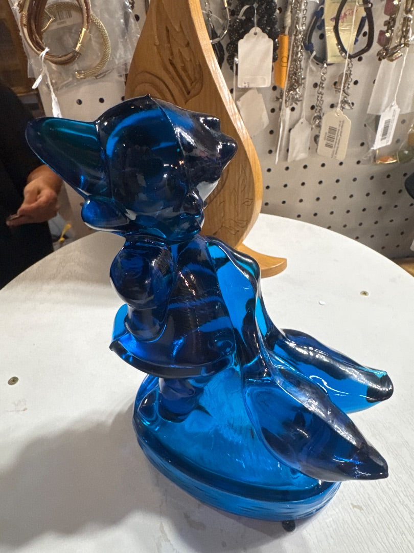 Blue glass figure with geese