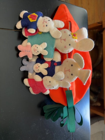 Vintage handmade carrot pouch with rabbit family