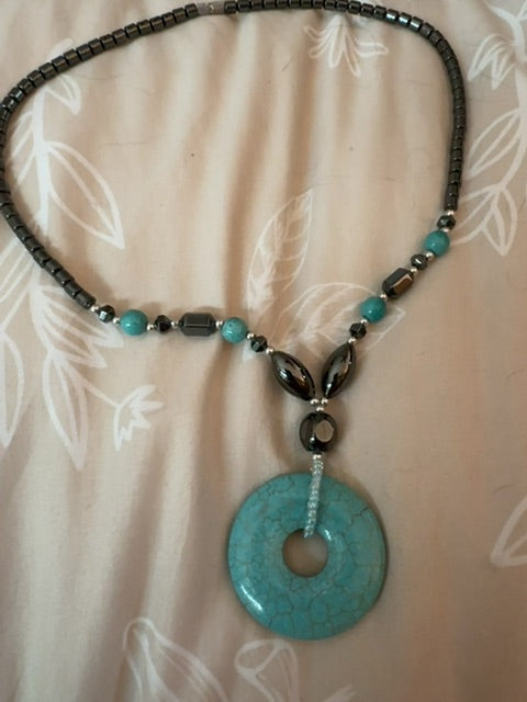 Hematite turq color peace buckle necklace