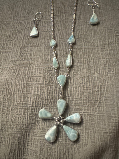 Light blue and silver Unknown Light blue necklace and earring set. Jewelry