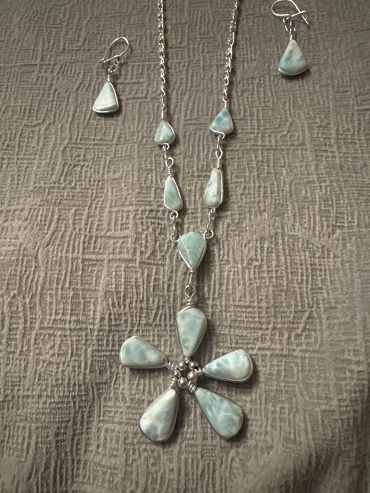 Light blue and silver Unknown Light blue necklace and earring set. Jewelry
