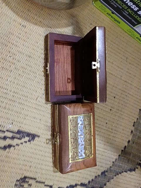 Wooden trinket box with metal design