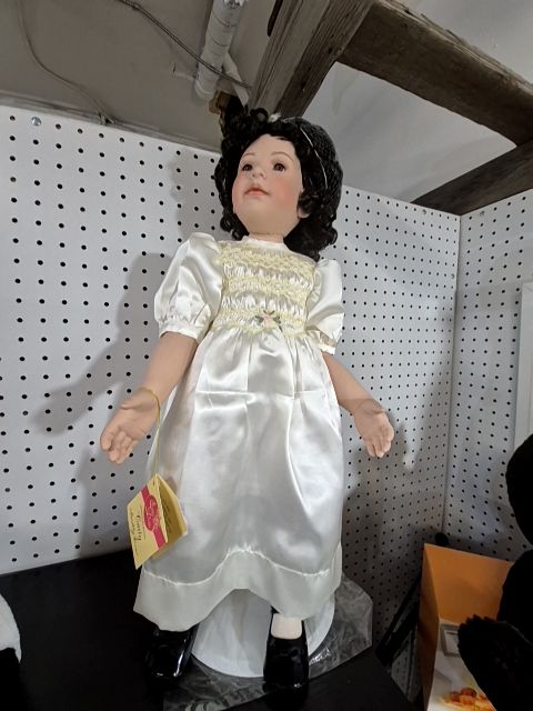 "Carly" porcelain doll by Dorothy Kreiss