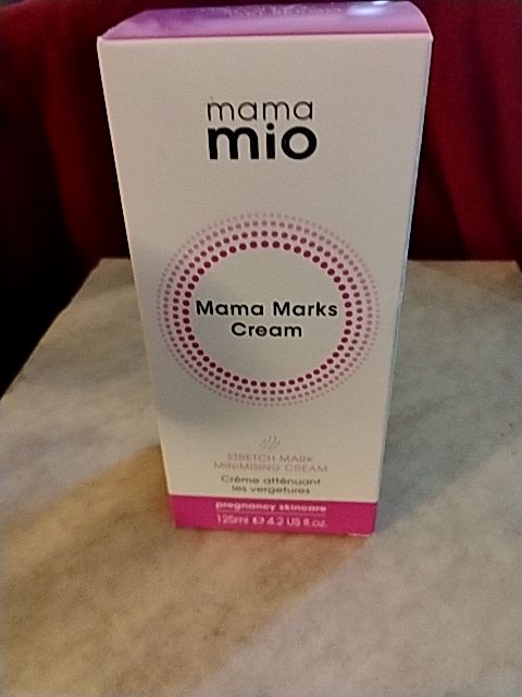 White and Neon Pink Box Mama Mio Mama Mio Stretch Mark Cream, 4.2 FL OZ