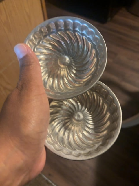 vintage aluminum Jell-O molds.