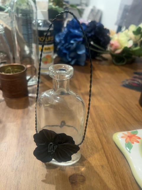 Vintage hanging flower bottle
