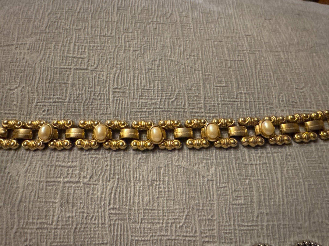 Silver and gold tone Unknown Costume bracelets