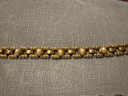 Silver and gold tone Unknown Costume bracelets