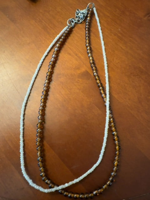Double strand white and amber color beaded necklace