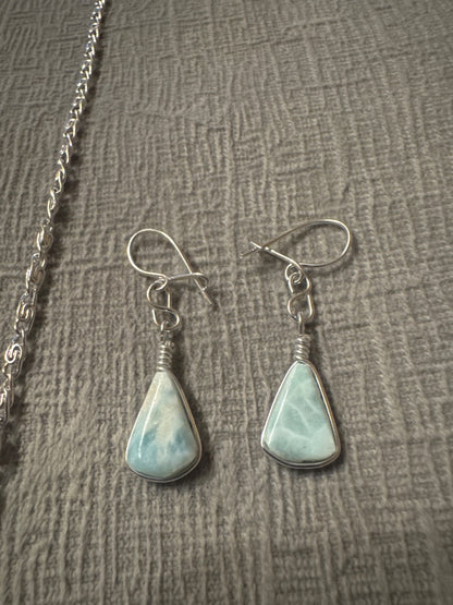 Light blue and silver Unknown Light blue necklace and earring set. Jewelry