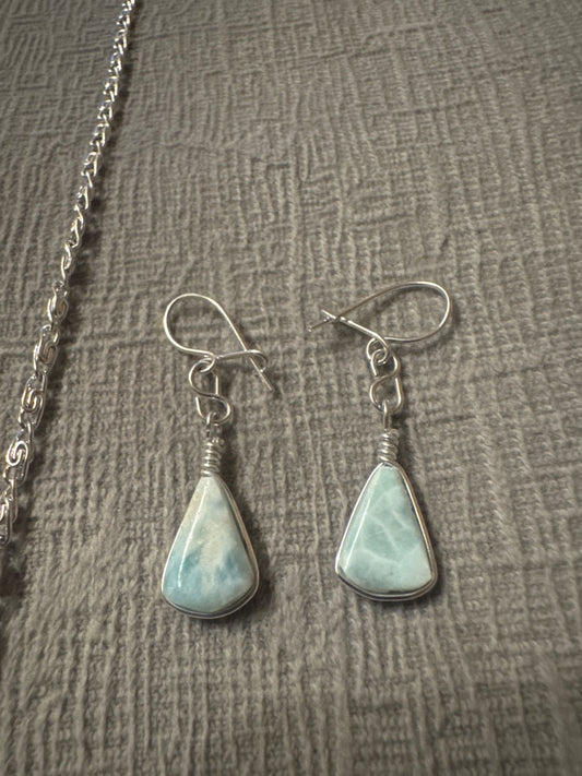 Light blue and silver Unknown Light blue necklace and earring set. Jewelry