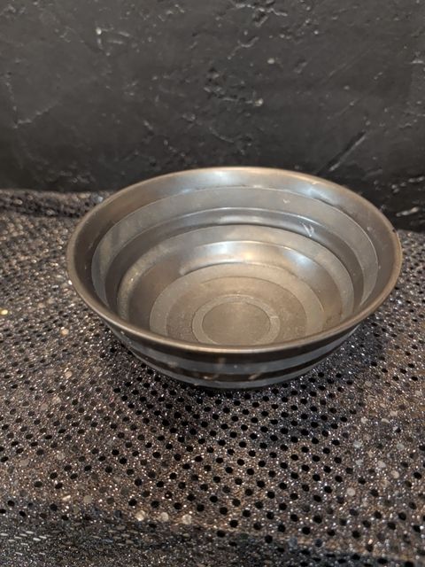 Black bowl w/ strip pattern