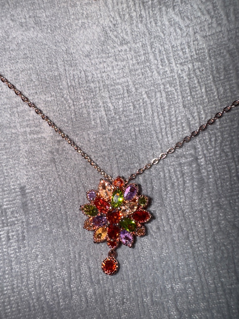 Multi, rose Unknown Rose gold tone setting with multi colored stones