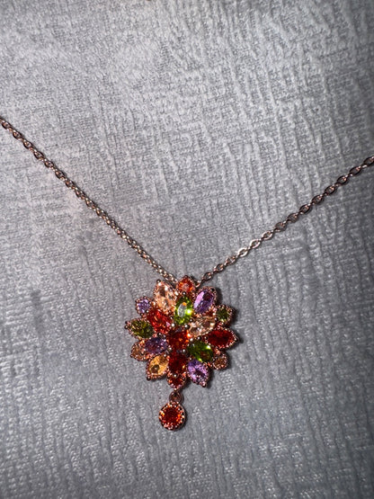 Multi, rose Unknown Rose gold tone setting with multi colored stones