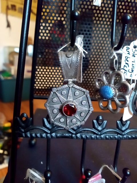 Sterling silver heavy pendant with red gem