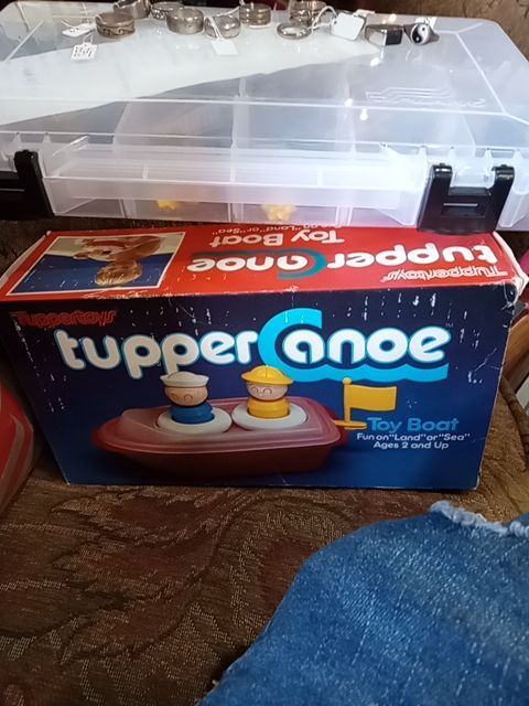 Antique new Tupperware Tupperware canoe