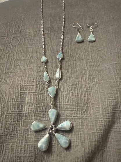 Light blue and silver Unknown Light blue necklace and earring set. Jewelry