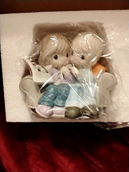 Light blue, tan, cream Precious Moments Precious Moments Figurine, 4 " H