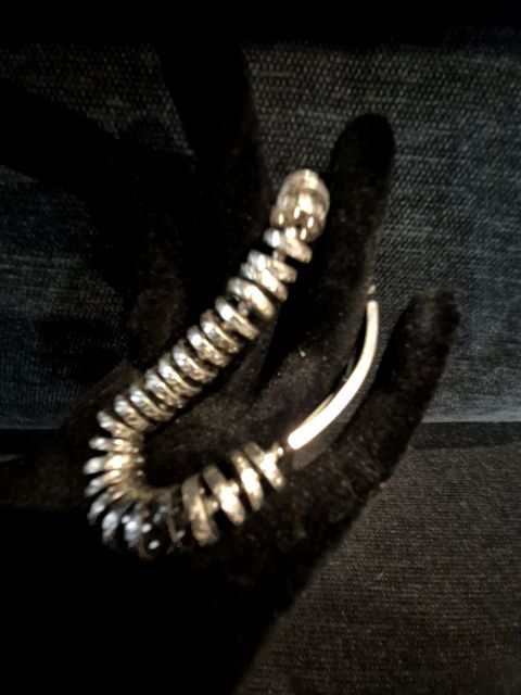 Silver  Metal Bracelet w/Cross plate and buttonlike beads