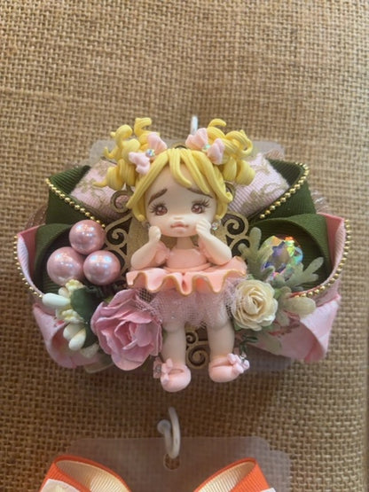MysticalCreationsByMaira Handcrafted Clay doll bow