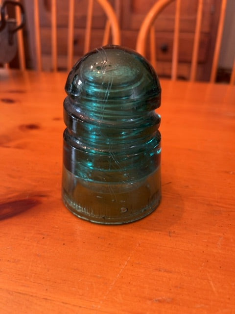 Vintage teal glass insulator