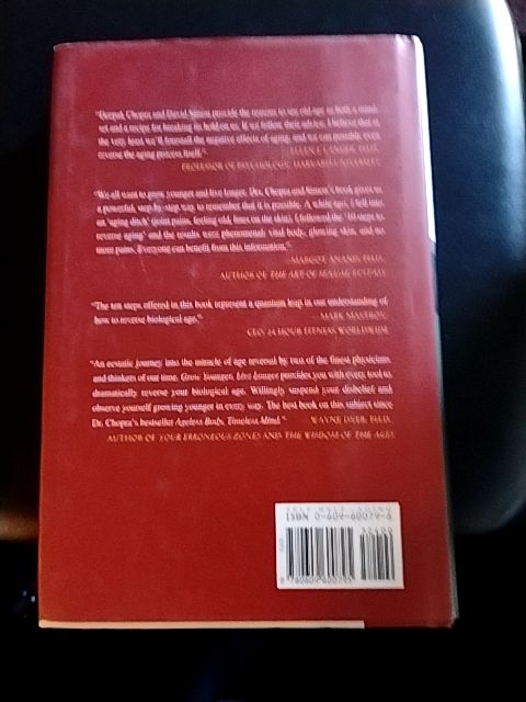 Wht, grn, burgundy  Book by Deep Chopra and David Simon