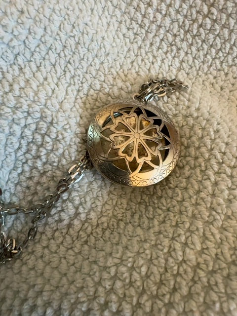 Silvertone filigree aromatherapy necklace