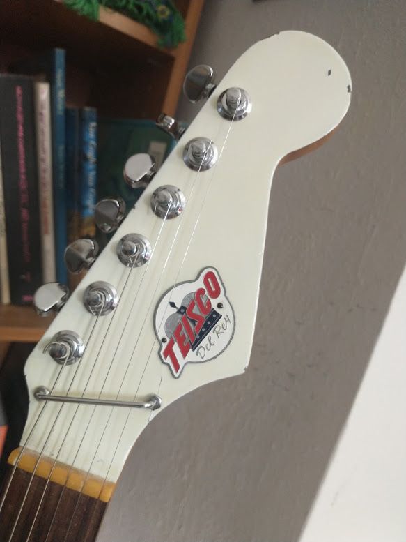 Vintage White Electric Guitar