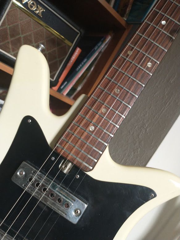 Vintage White Electric Guitar